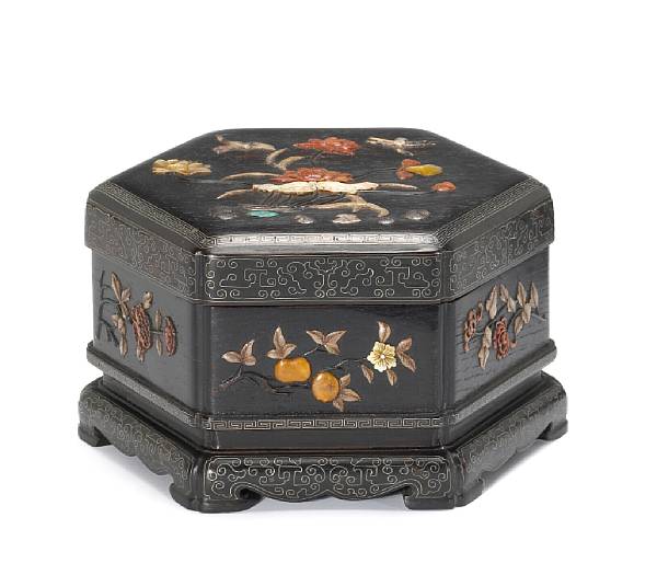 Appraisal: A zitan hexagonal covered box with colored overlay and silver