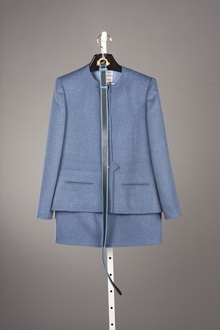 Appraisal: Andr Laug blue wool skirt suit with belt Size to