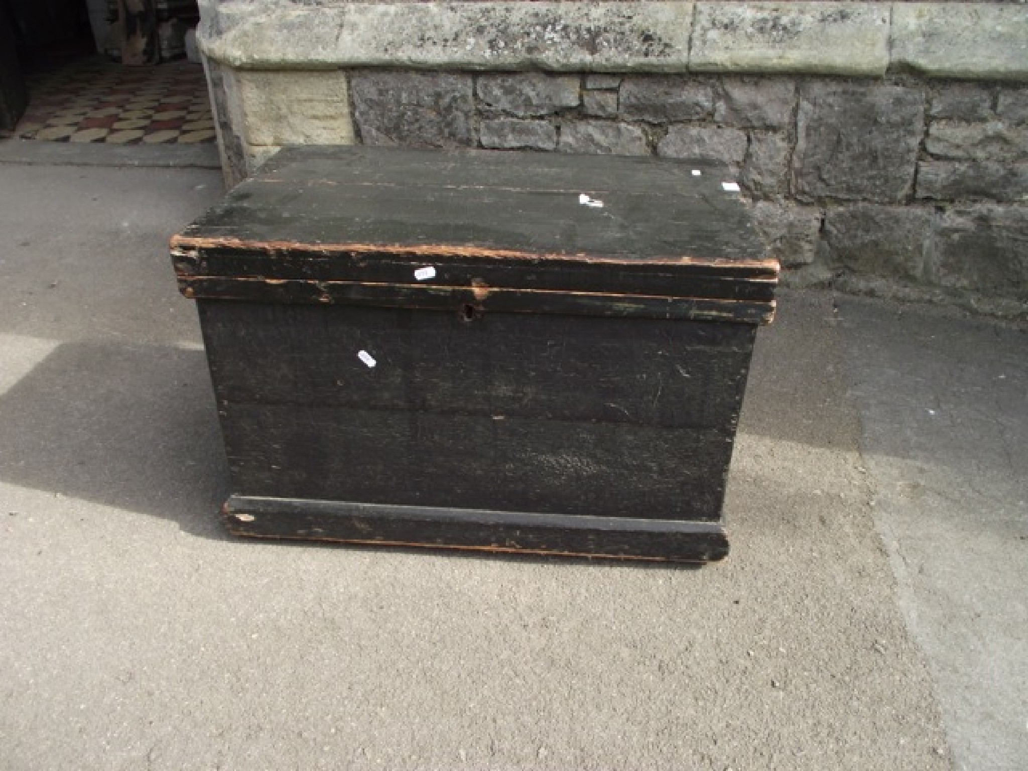 Appraisal: A th century stained pine box with hinged lid and