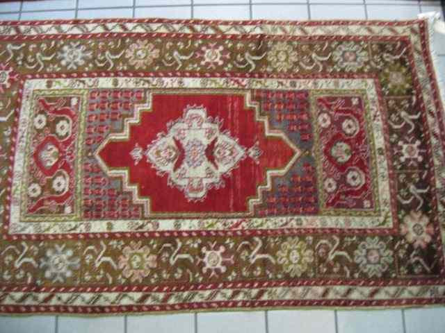 Appraisal: Oushak Turkish Handmade Rug browns ivory reds florals ' ''