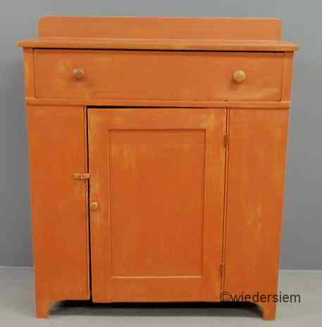 Appraisal: Pennsylvania country red painted cupboard c with a backsplash single