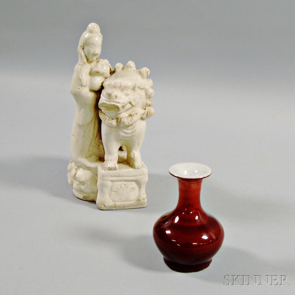 Appraisal: Figure of Guanyin and a Flambe Vase China th century