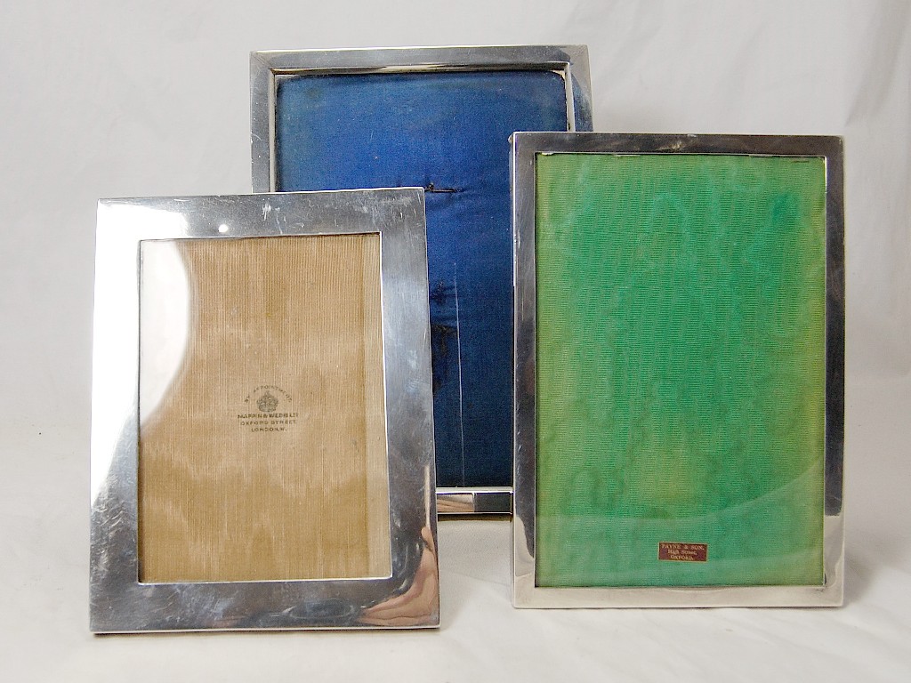 Appraisal: Three rectangular silver photograph frames all with easel backs cm