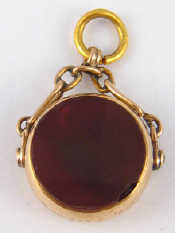 Appraisal: A carat gold swivel seal set with bloodstone and cornelian