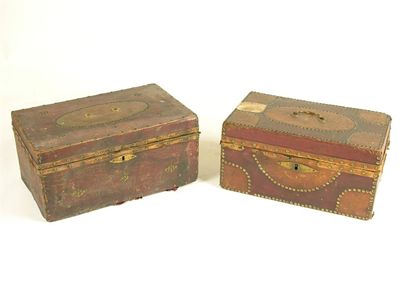 Appraisal: Two th century red leather covered small trunks with brass