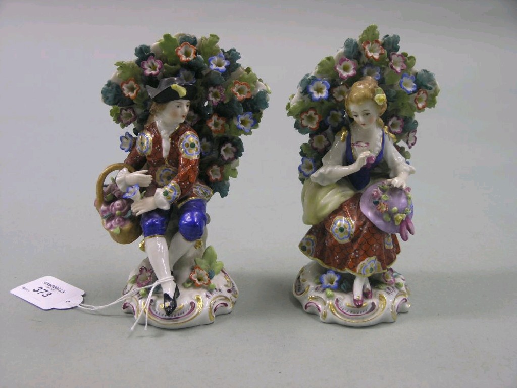 Appraisal: A pair of Samson-type porcelain bockage figures male seated with