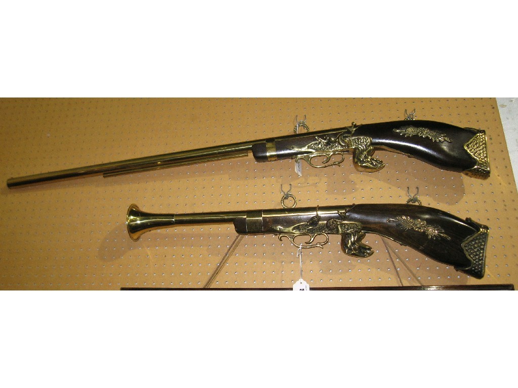 Appraisal: Lot comprising wall mounted ornamental musket and blunderbuss