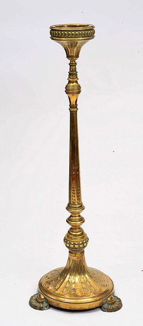 Appraisal: AN AESTHETIC MOVEMENT EMBOSSED BRASS ECCLESIASTICAL FLOWER STAND on a