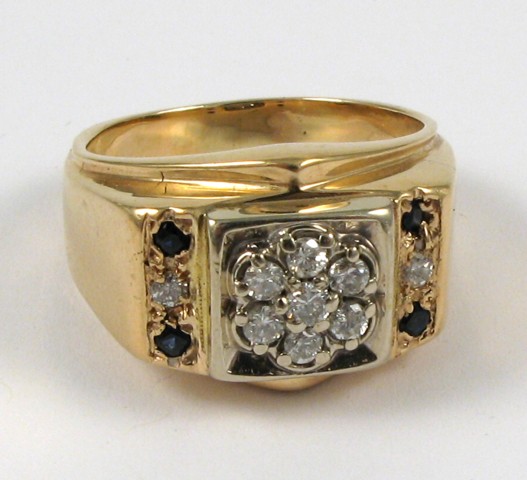 Appraisal: SAPPHIRE DIAMOND AND YELLOW GOLD RING The heavy k yellow