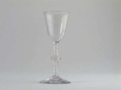 Appraisal: A wine glass with a plain bowl raised on a