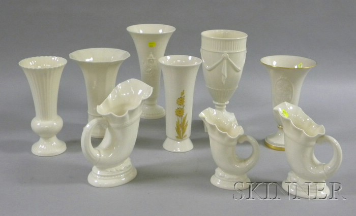 Appraisal: Nine Lenox Embossed Porcelain Vases set of three graduated footed