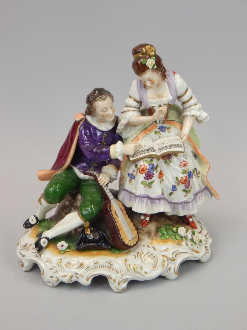 Appraisal: A German porcelain centrepiece in the form of a musician