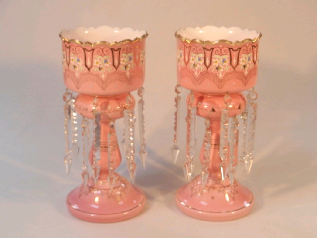 Appraisal: A pair of Victorian pink glass lustre vases on baluster