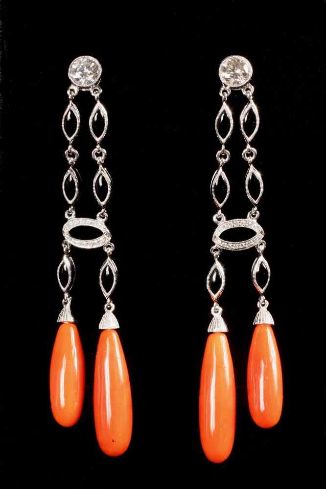 Appraisal: EARRINGS - One pair of platinum diamond coral and onyx