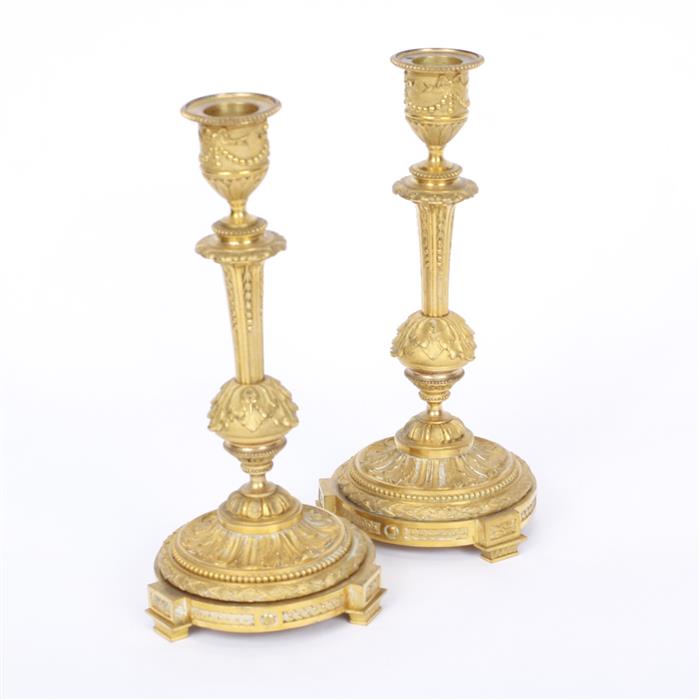 Appraisal: Pair French Neoclassical dore' bronze candlesticks H