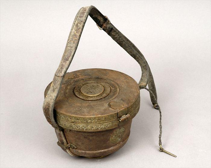 Appraisal: Southeast Asian Brass-Mounted Metal Basket with Calligraphic Rondels and Leather