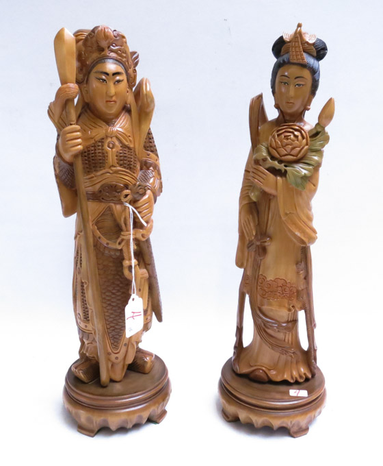 Appraisal: CHINESE CARVED HARDWOOD FIGURAL SCULPTURES depicting standing Emperor and Empress