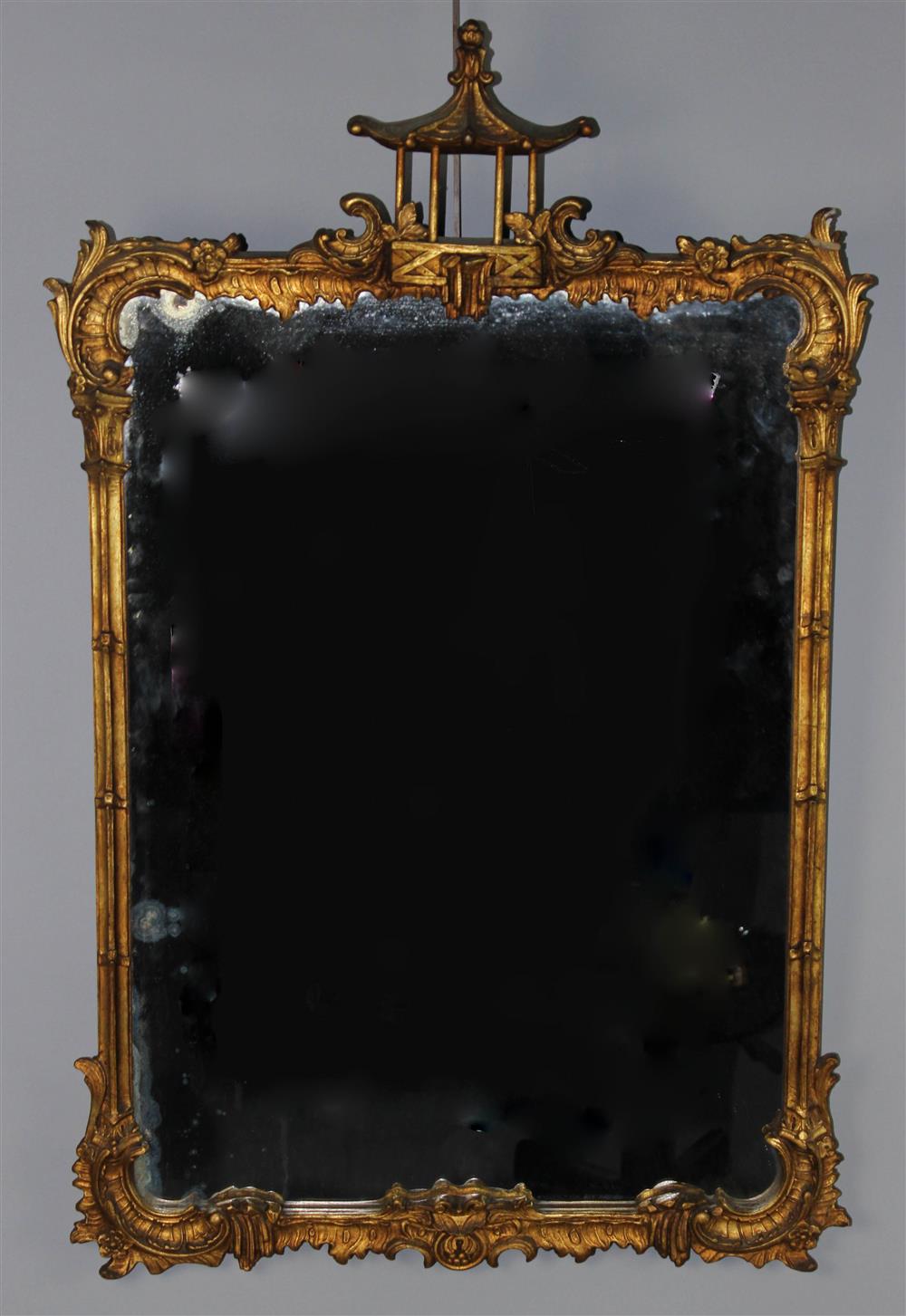 Appraisal: CHINOISERIE STYLE GILTWOOD MIRROR the rectangular molded frame with rocaille