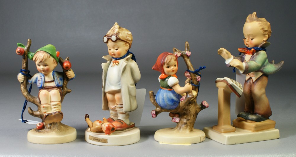 Appraisal: Hummel figurines Apple Tree Girl Hum some crazing Apple Tree