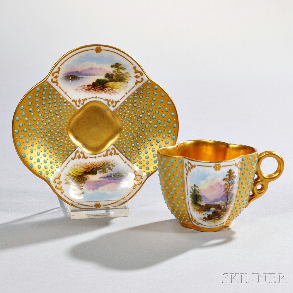 Appraisal: Jeweled Coalport Porcelain Quatrefoil-shaped Cup and Saucer England late th