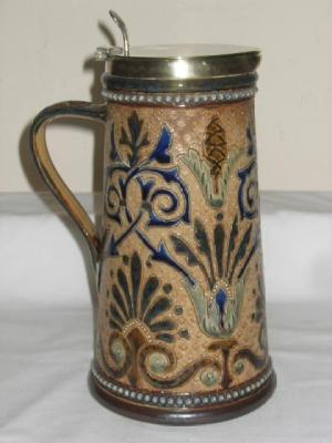 Appraisal: A DOULTON LAMBETH STONEWARE JUG by Martha Rogers of tapering