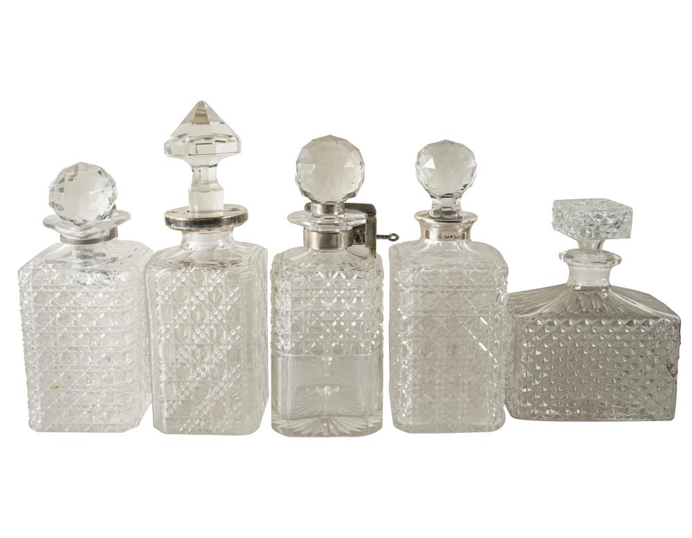 Appraisal: FIVE ASSORTED CRYSTAL DECANTERSProvenance The Estate of Barry Tarlow Los