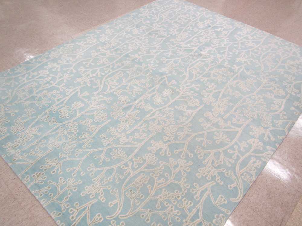 Appraisal: A CONTEMPORARY NEPALI TAMARIAN WOOL SILK CARPET sprig pattern on