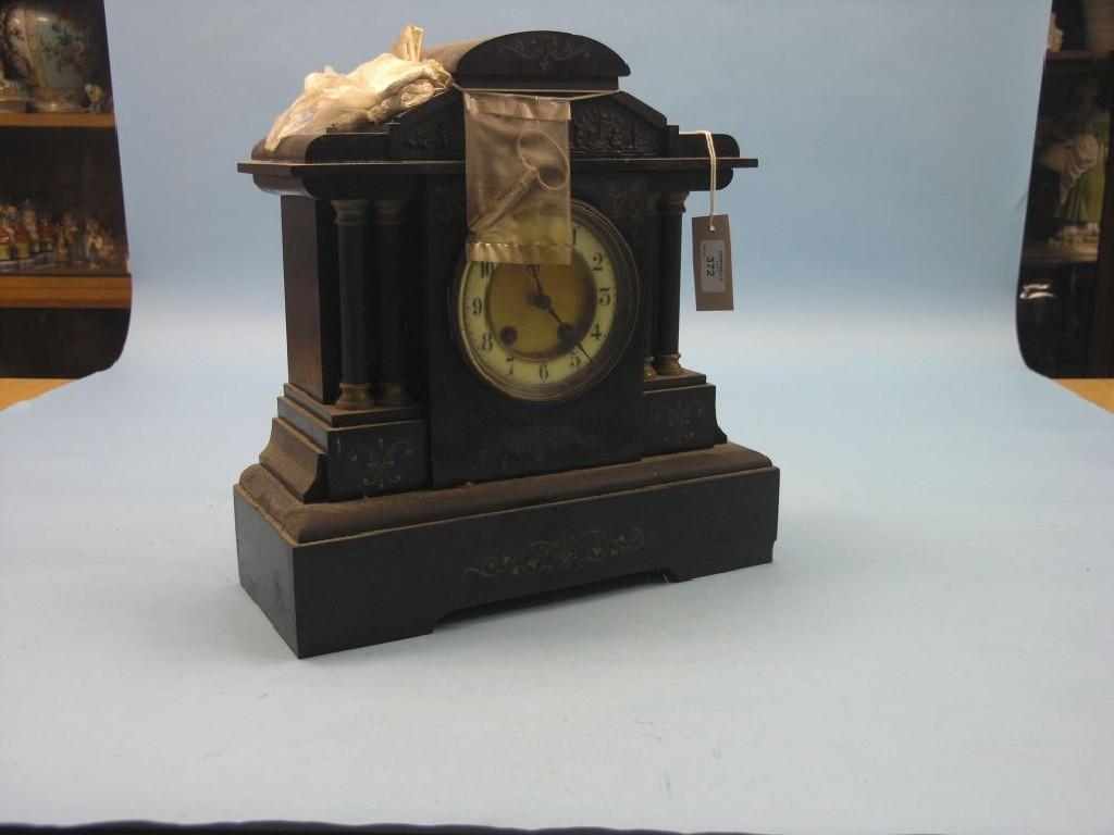 Appraisal: A large Victorian black slate mantel clock architectural form with