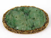 Appraisal: A vintage gilt metal tests silver Chinese jade brooch unascribed