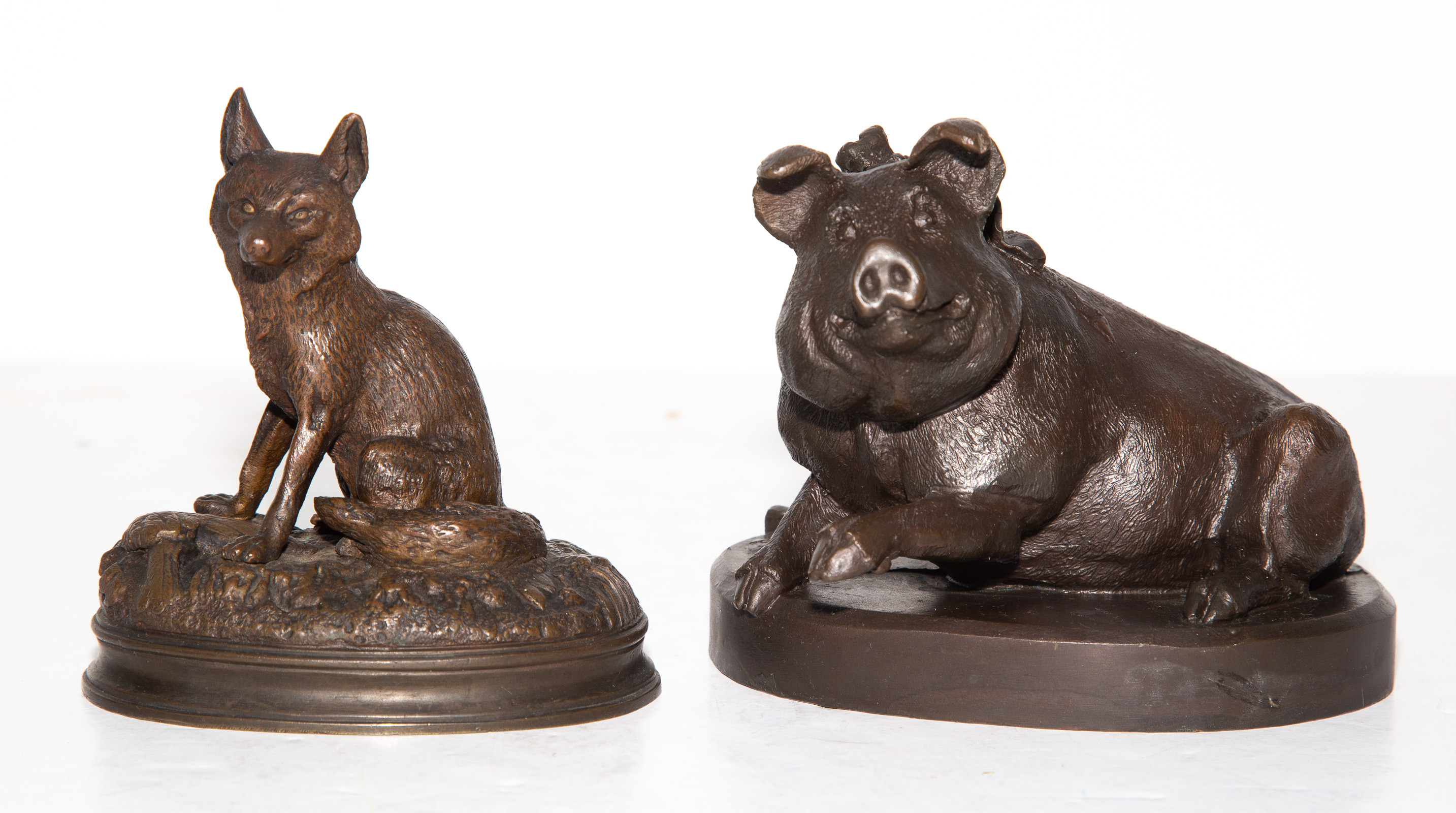 Appraisal: TWO PATINATED BRONZE ANIMAL FIGURES Comprising a Fox unsigned early