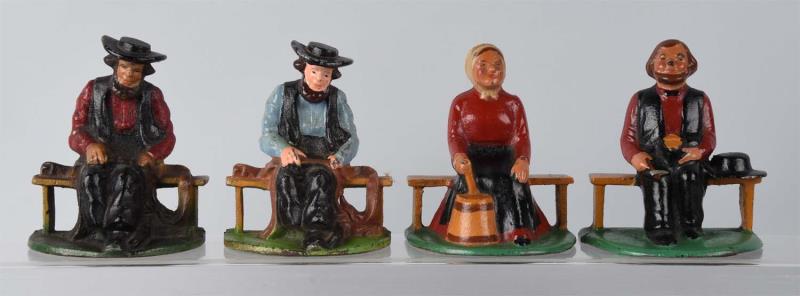 Appraisal: Cast Iron Assorted Amish Figure Bookends Includes pair of Amish