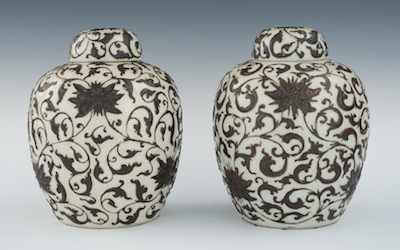 Appraisal: A Pair of Chinese Pottery Vases A pair of melon