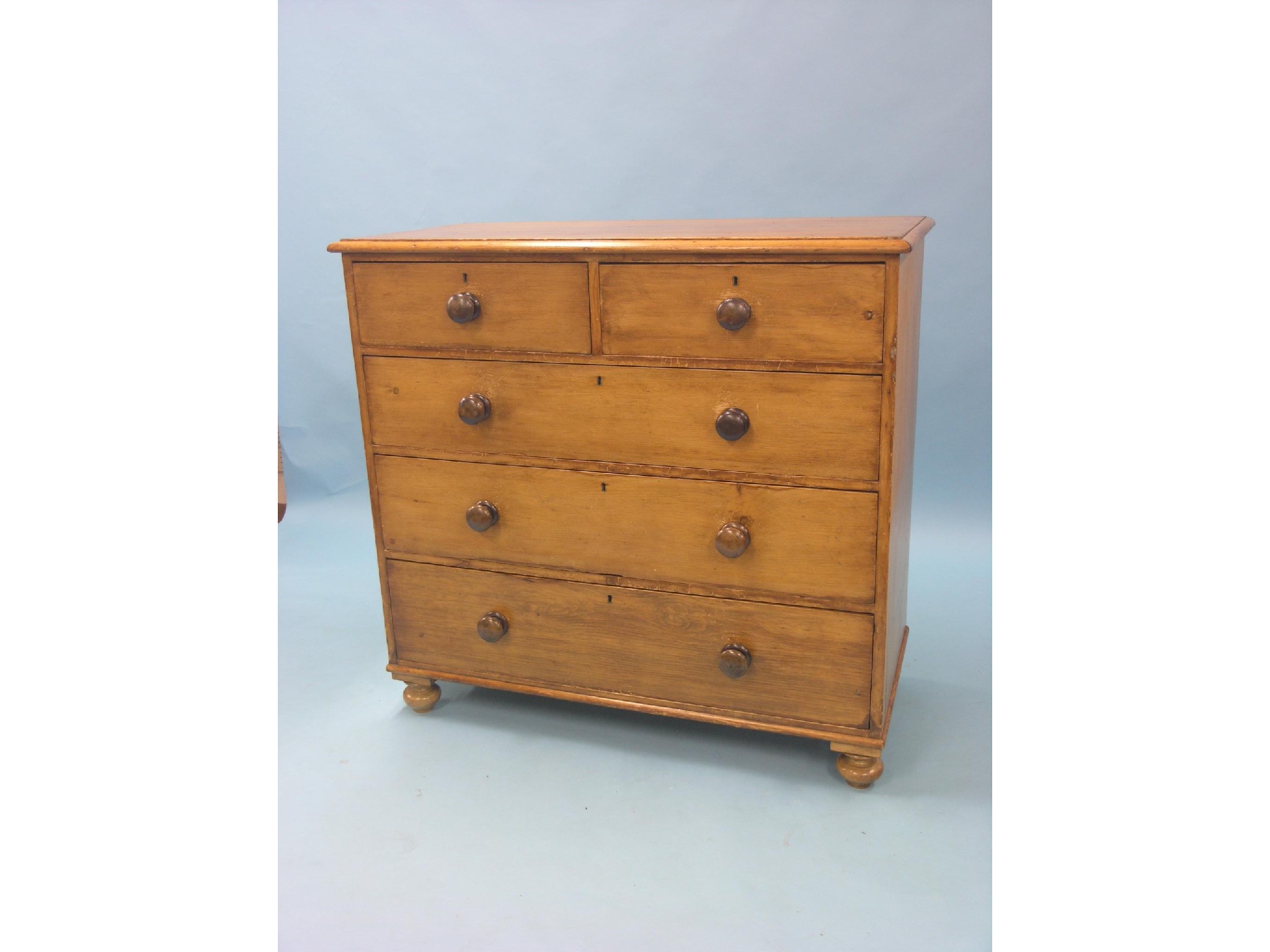 Appraisal: A Victorian stripped and waxed pine bedroom chest two short