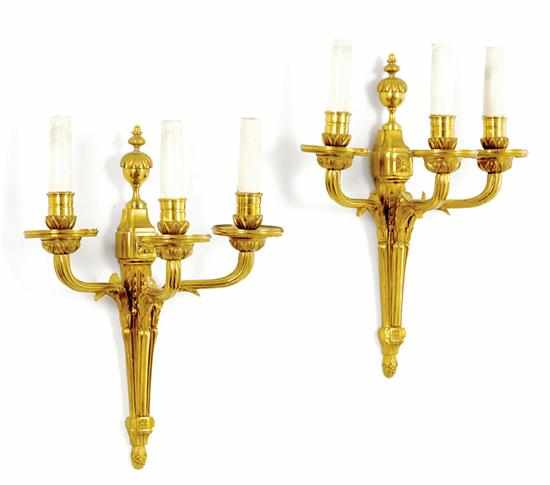 Appraisal: Fine Louis XVI style gilt-bronze three-light sconces circa urn finial