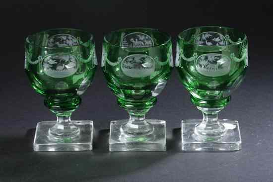 Appraisal: TWELVE BOHEMIAN ETCHED AND GREEN-FLASHED GLASS GOBLETS Each with clear