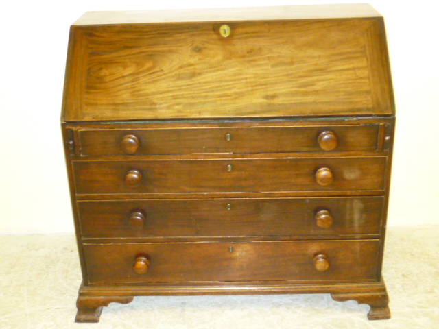 Appraisal: A GEORGE III MAHOGANY BUREAU th century the fall front