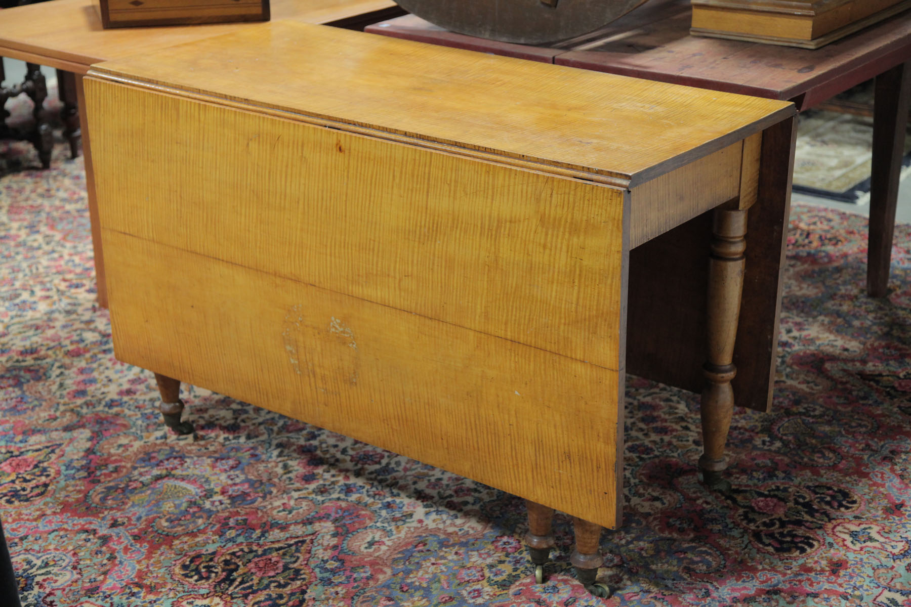 Appraisal: DROP LEAF TABLE American early th century Curly maple with