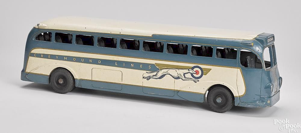 Appraisal: Large pressed steel Greyhound bus Large cast aluminum Commerce Pattern