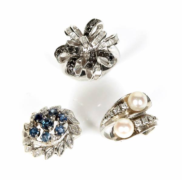 Appraisal: A collection of five gem-set diamond and white gold rings