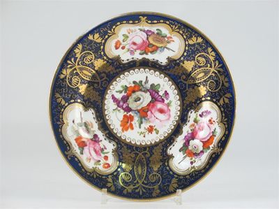 Appraisal: A good English porcelain plate painted with three panels containing