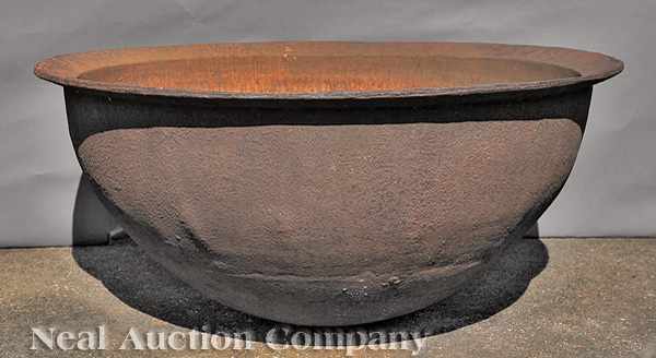 Appraisal: An American Cast Iron Sugar Kettle flared rim deep bowl