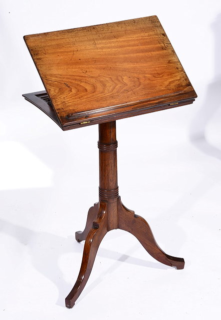 Appraisal: A GEORGE III MAHOGANY READING TABLE with hinged folding top