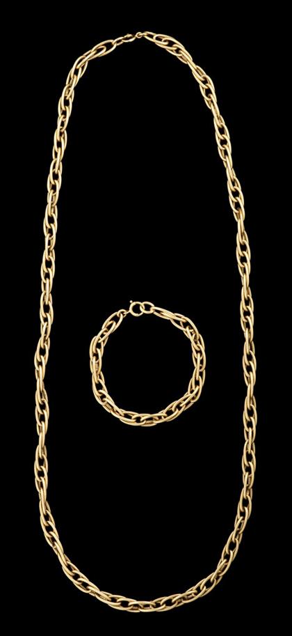 Appraisal: karat yellow gold necklace and bracelet set Elongated modified curb