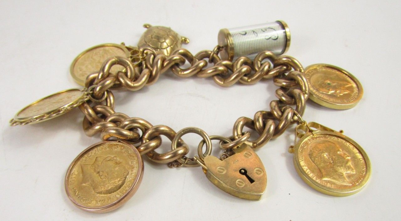 Appraisal: A ct gold curb link bracelet on a heart shaped