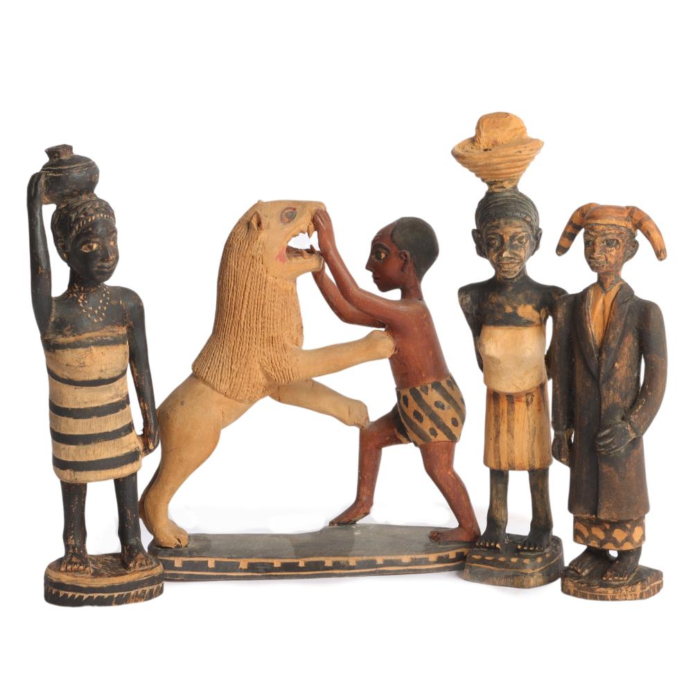 Appraisal: FOUR AFRICAN HAND-CARVED AND PAINTED FOLK ART FIGURES INCLUDING MAN