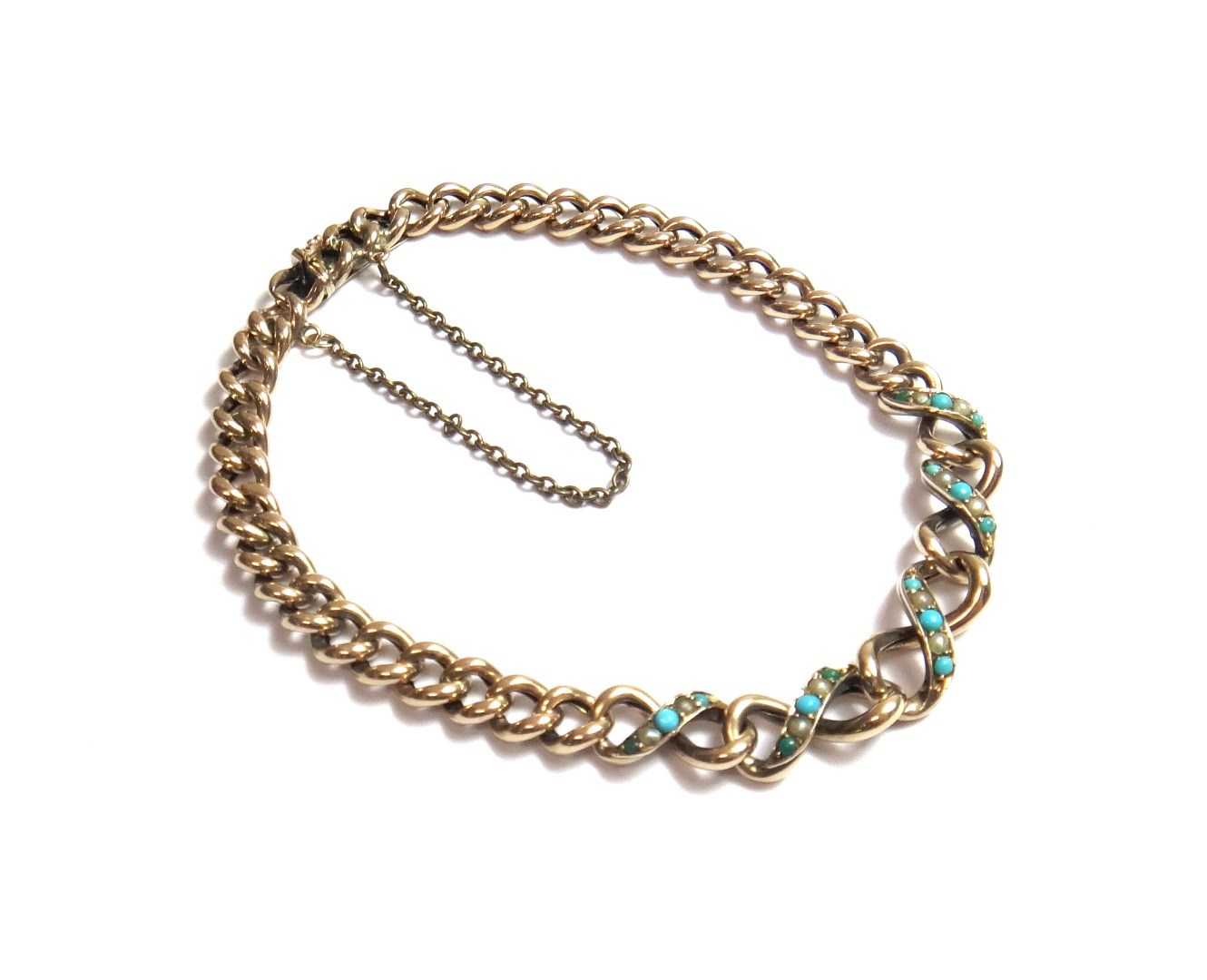 Appraisal: A gold seed pearl and turquoise set bracelet in a