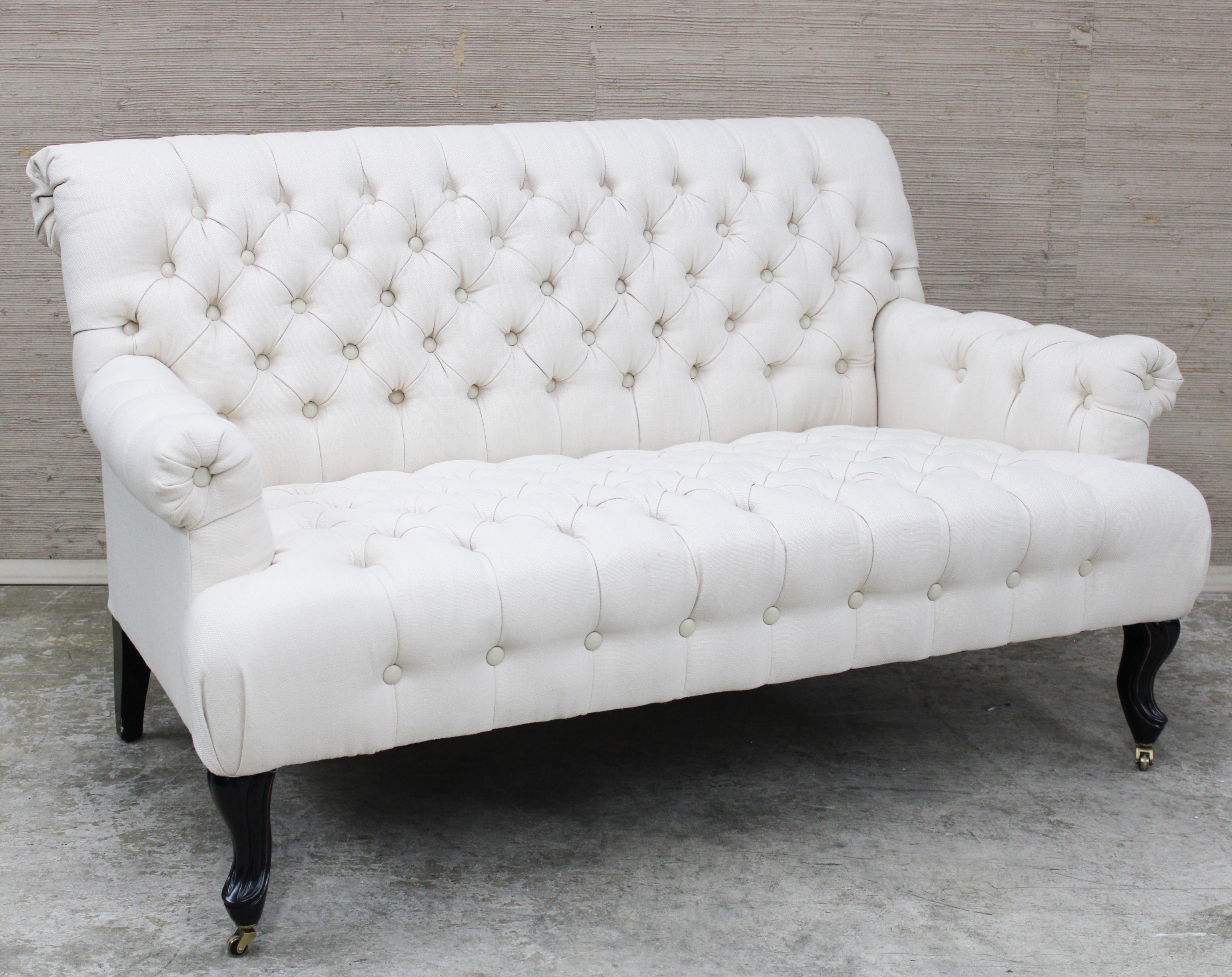 Appraisal: ROLL-OVER BACK SETTEE Tufted upholstered roll-over back sette H W