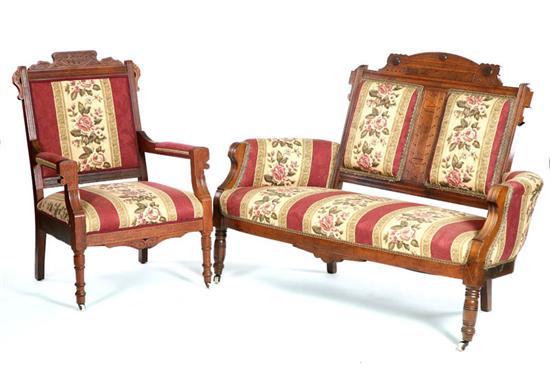 Appraisal: EASTLAKE STYLE PARLOR SET Walnut with carved accents turned legs