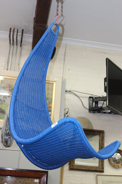 Appraisal: A MODERN BLUE WICKERWORK HANGING CHAIR approximately cm wide