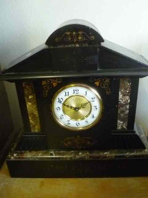 Appraisal: A LARGE VICTORIAN BLACK SLATE MANTEL CLOCK with inset marble